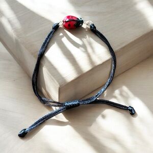 Black adjustable Bracelet with Red Ladybug Charm